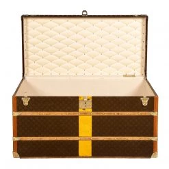 A Louis Vuitton Courier Trunk In Monogrammed Canvas Trunks