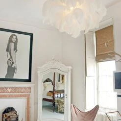 A Modern Grand Tour The Feather Chandelier Lighting