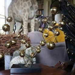 A Modern Grand Tour Curiosities A Polished Gold Molecular Sculpture
