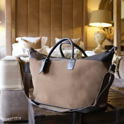 A Modern Grand Tour Large Aynhoe Overnight Bag In Stone Suede Homeware